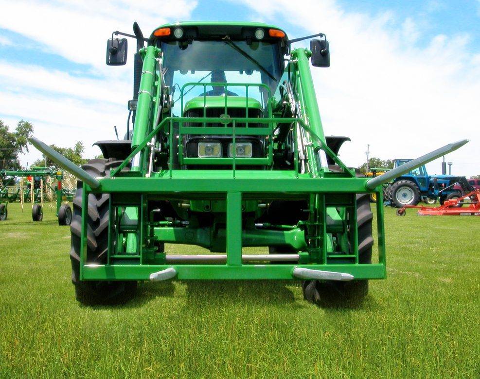 green John Deere Two Bale Mover with four 49″ super penetrating spears